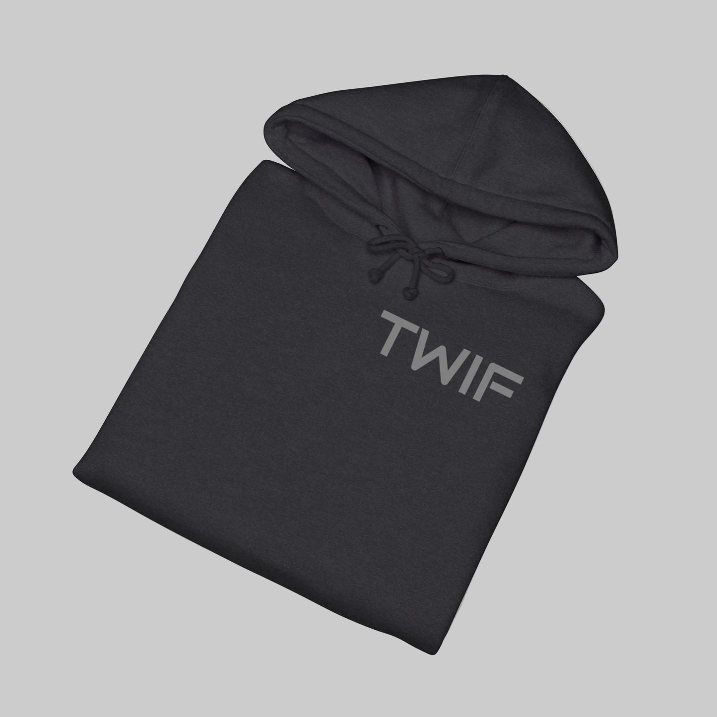 Black hoodie folded on a white background